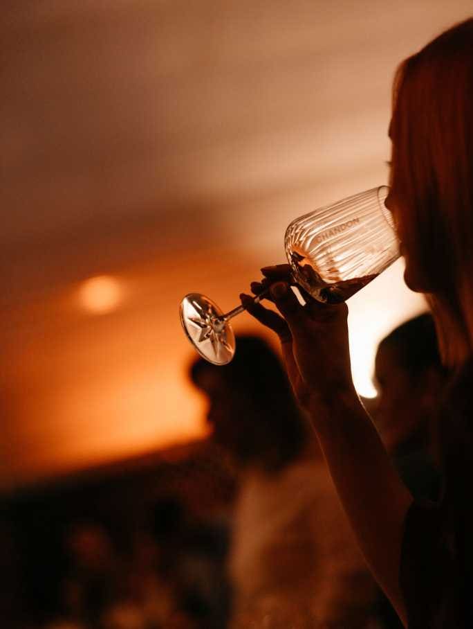 MOODY RIDDLING HALL DRINKING WINE 