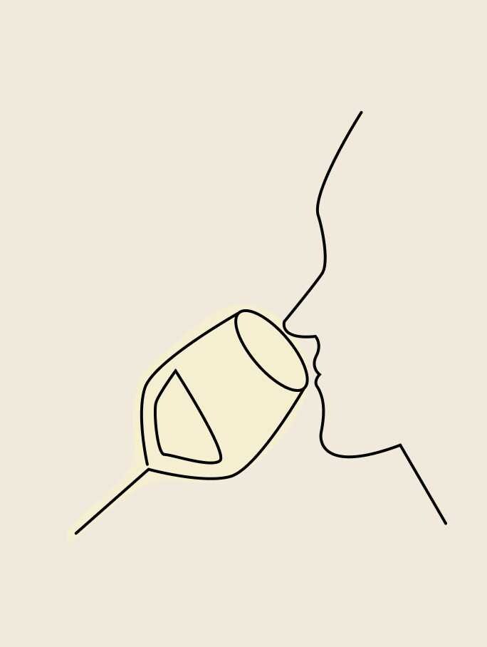 A person tasting CHANDON sparkling wine.